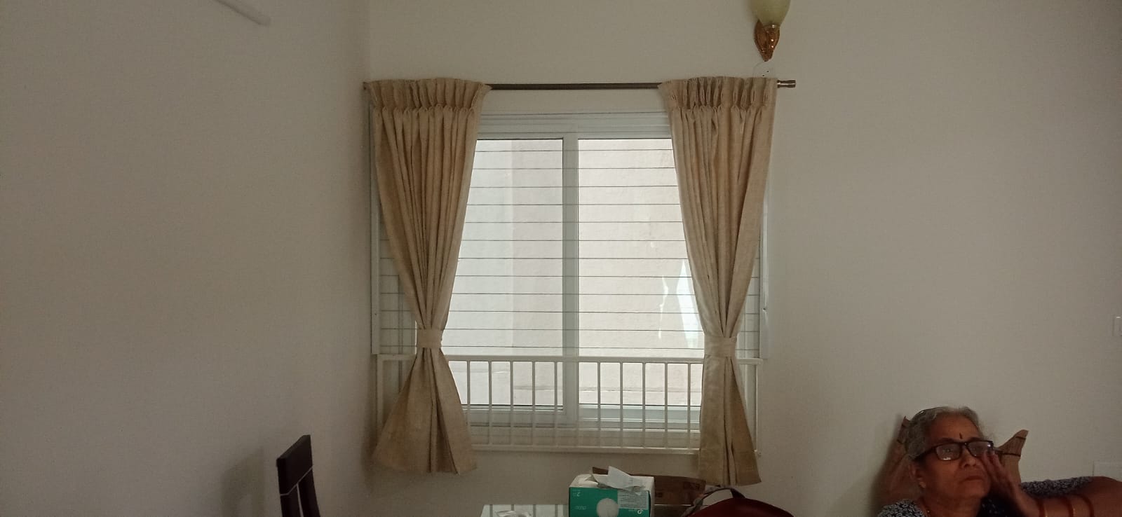 Elegant curtain draping in a modern Indian living room — HappyLoom project