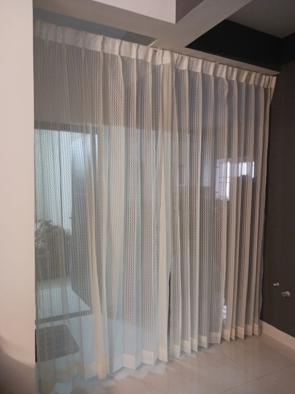 Printed curtains adding colour to an Indian home interior — HappyLoom project