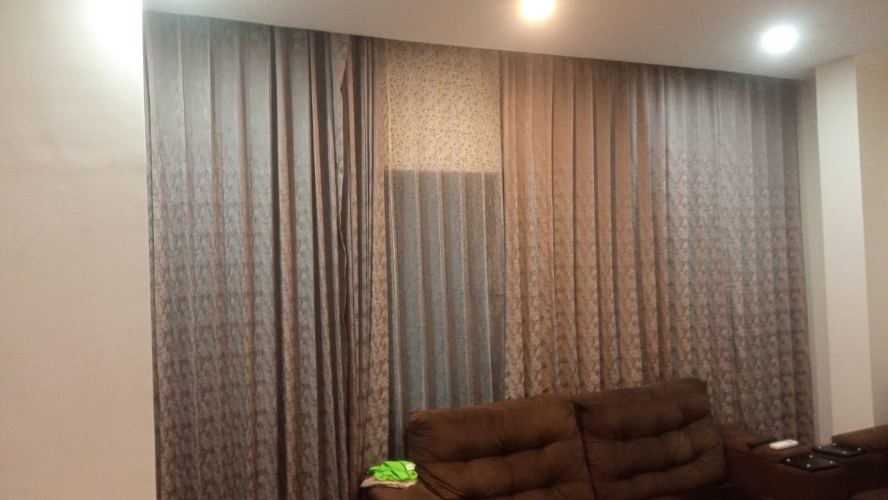 Curtains with decorative finials in a premium Bangalore home — HappyLoom